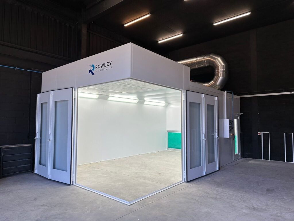 Image showing a car spray booth with corner opening doors